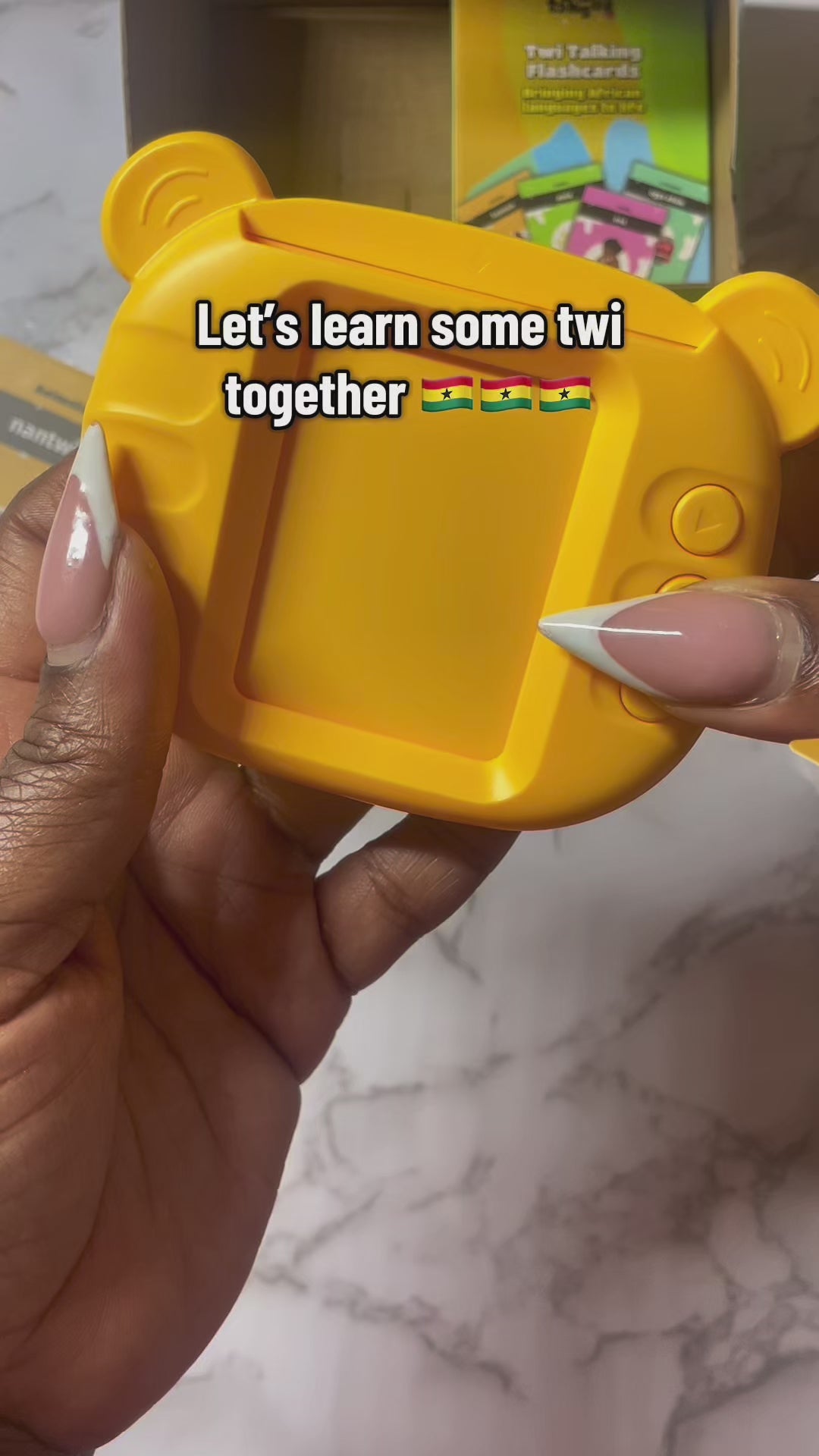 Mother and daughter playing with Twi Talking Flashcards and connecting with culture.